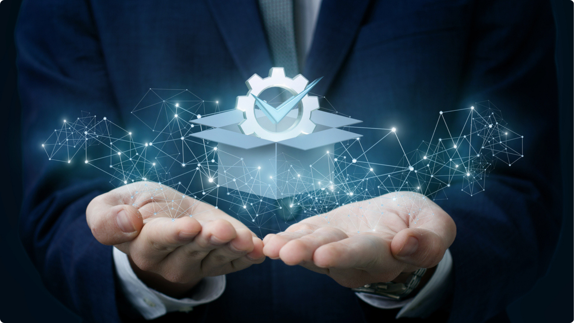 Project delivery represented by a holographic box with a cog and a tick showing its success